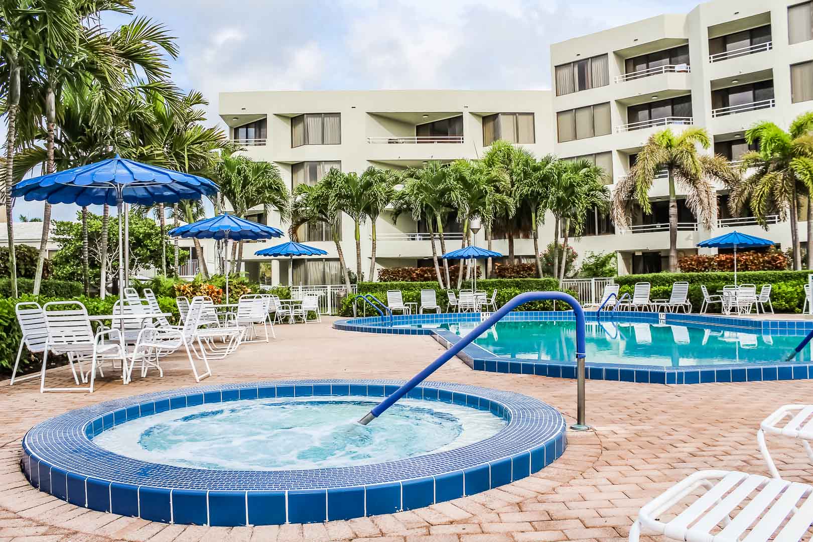 A relaxing Pool and Jacuzzi at VRI's Berkshire by the Sea in Florida.
